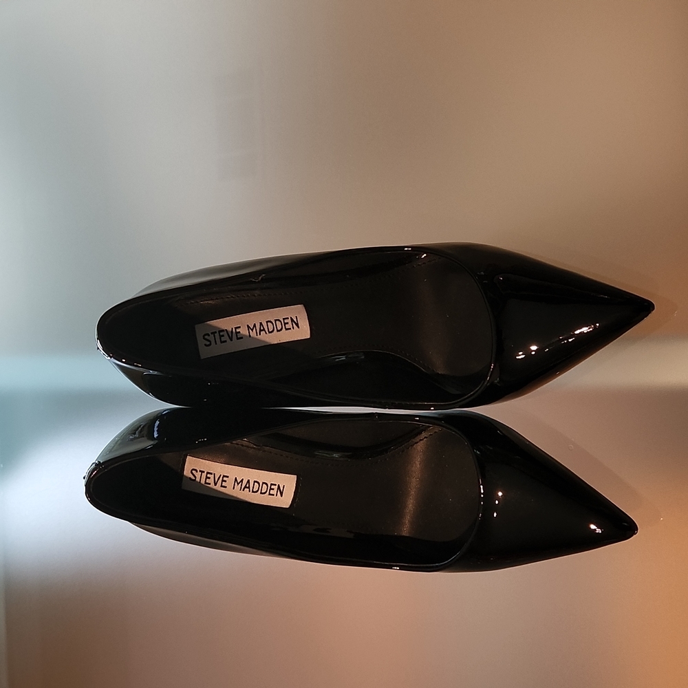 NEW,  never worn black patent steve madden pumps with flared heel.  5.5